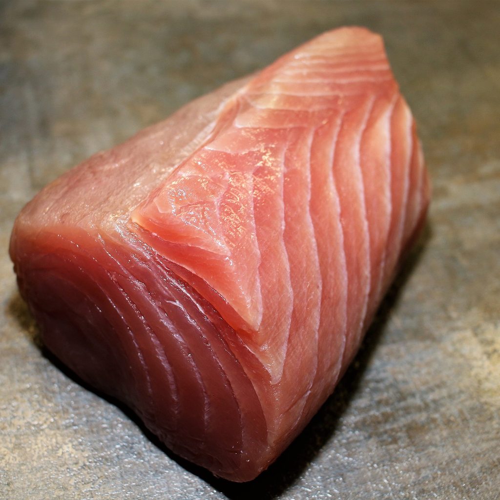 Raw tuna fillet on a counter