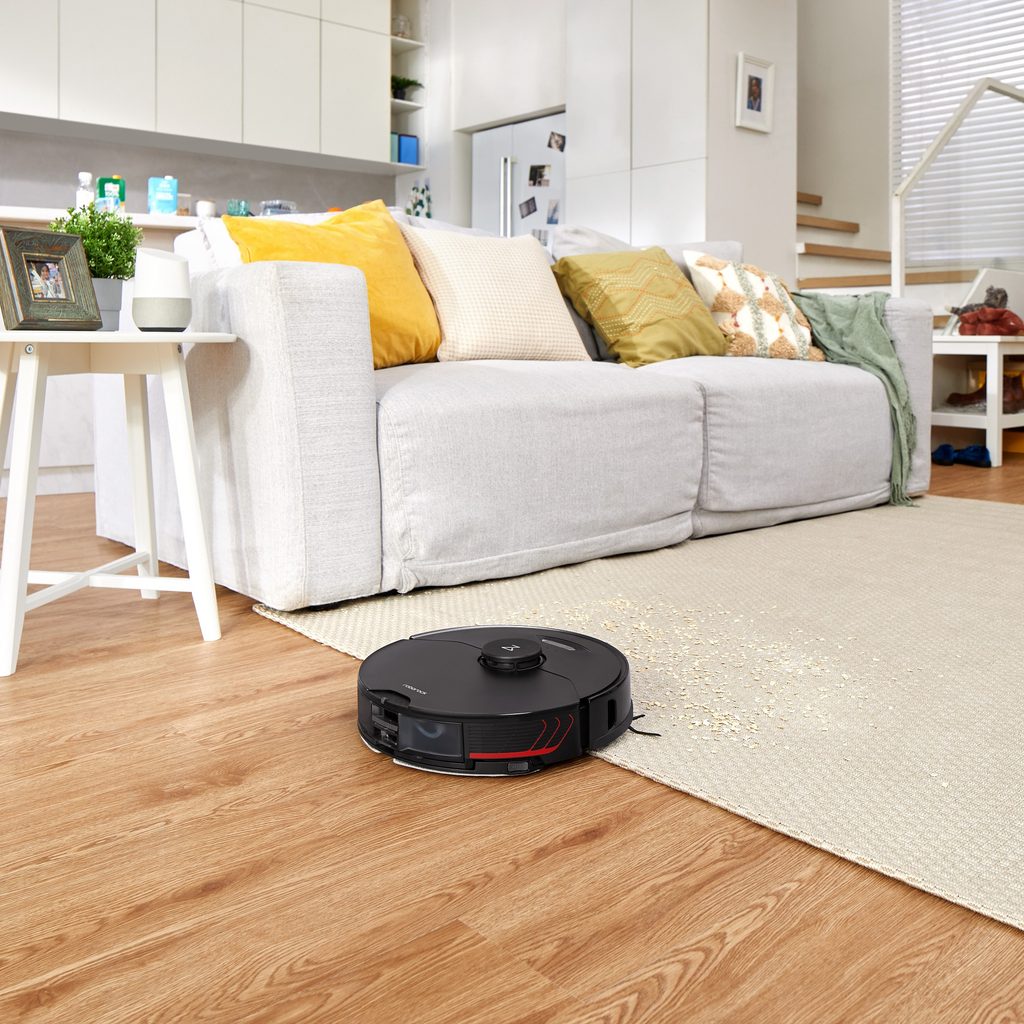 Roborock S7 MaxV Plus cleaning carpet and hard floors with ease.