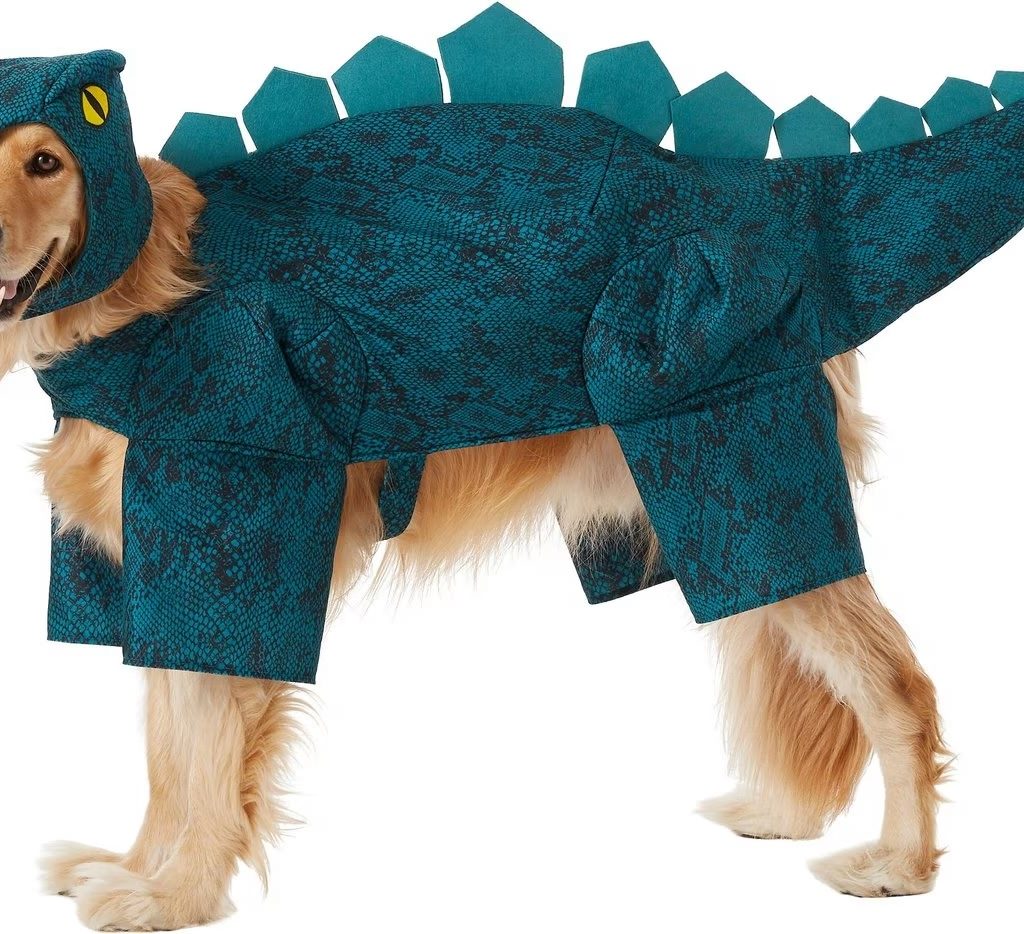 A dog in a dinosaur costume