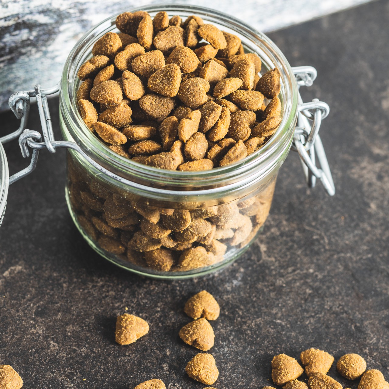 Glass container holding pet food