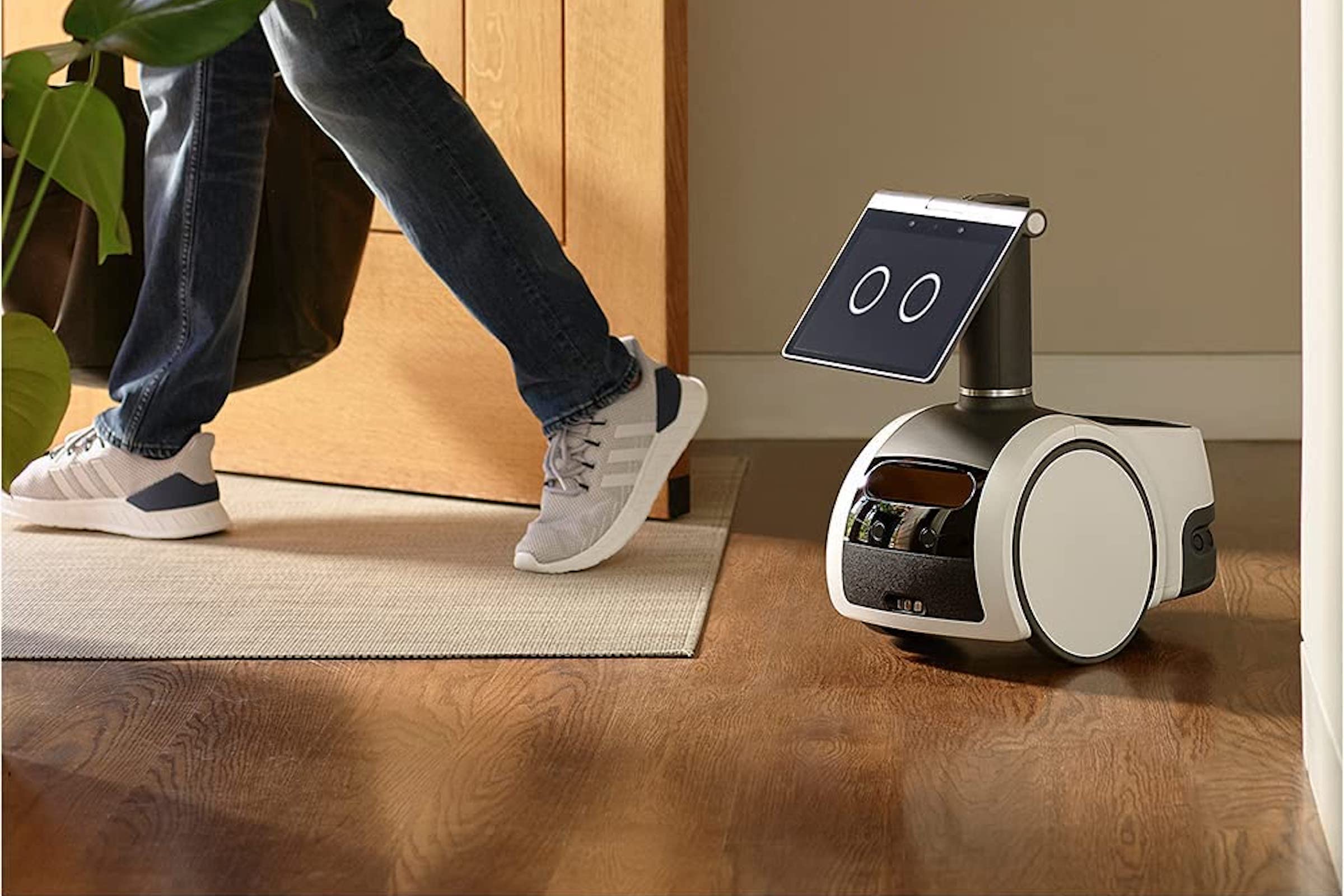Amazon Astro home assistant waits at the door