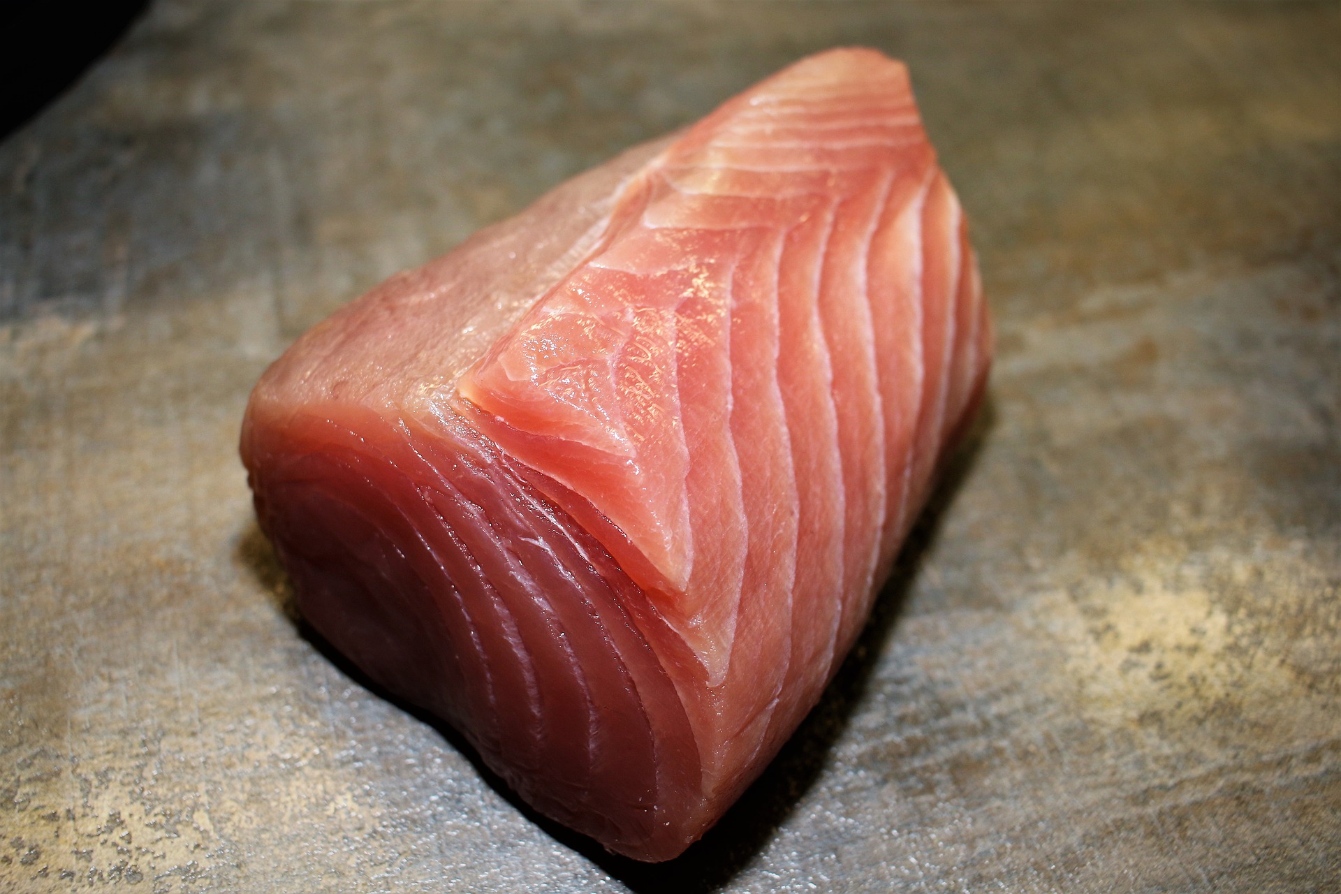 Raw tuna fillet on a counter
