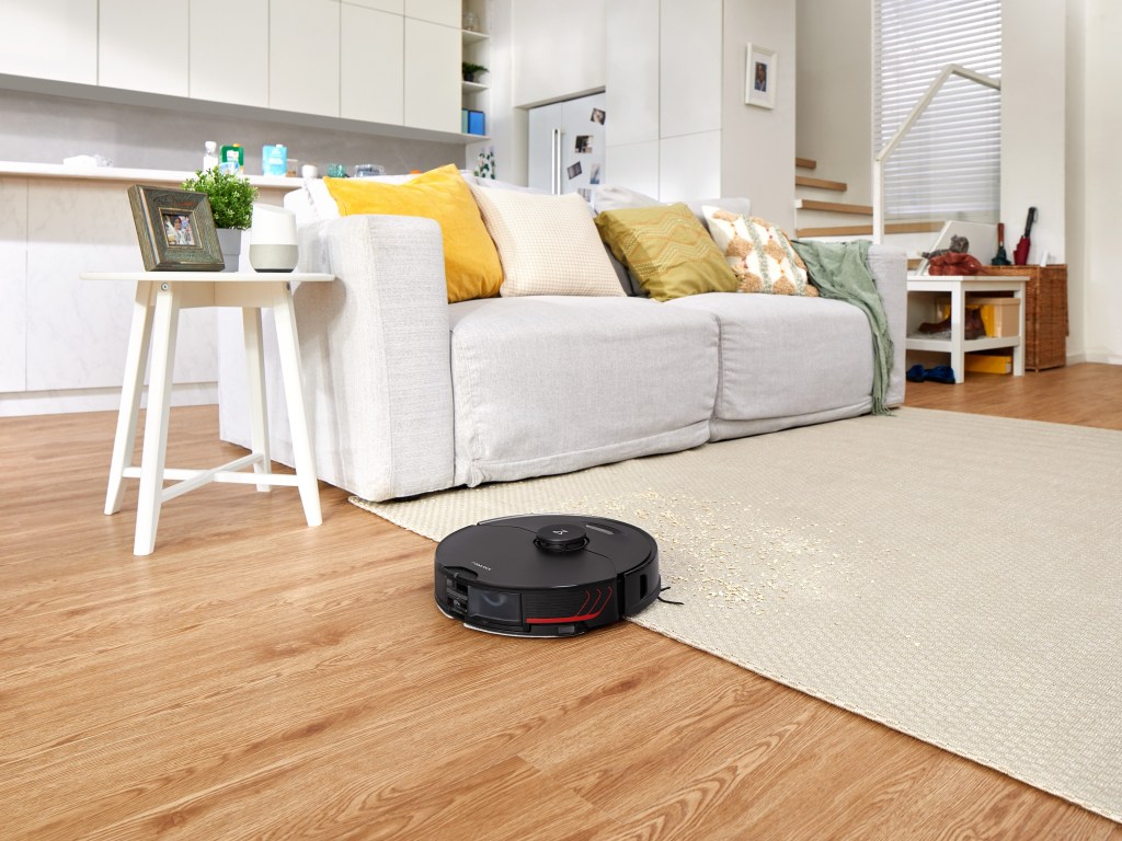 Roborock S7 MaxV Plus cleaning carpet and hard floors with ease.