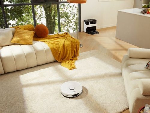 The S7 Max Ultra placed in a clean and tidy white living room.